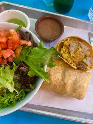 Vegan breakfast burrito with vegan sausages, egg and tater tots 👌🏻 at Otro Día Tacos in Beverly Hills