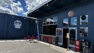 Some seating outside the front. Also more tables in the back patio.  at Tacovore in Eugene