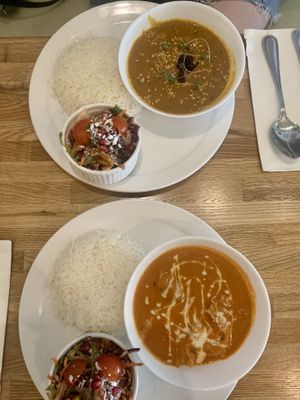 Butter chicken combo (front), grandmas coconut curry (back) - bread not pictured   at Tula in Montreal