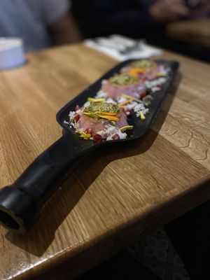 Panna cotta pétale de rose, éclats pistache qui goûte le ciel 🤌  at Tula in Montreal