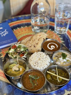 Vegan lunch - the thali for lunch is a wonderful assortment of curries, daals, and cumin rice. Superb, flavourful and healthy!  at Tula in Montreal