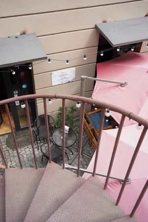 The café is slightly hidden, downstairs from the adjacent street. at Stricha in Tbilisi