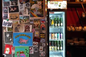 Fridges with stickers and drinks. at Stricha in Tbilisi