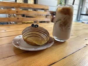 Iced coffee with hazelnut milk and limoncello donut  at Stricha in Tbilisi