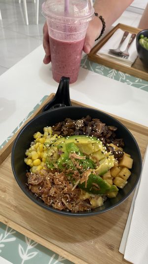 Vegetarian poke bowl. Avo, mushroom, sweet corn, pineapple, crispy onion, spring onion, brown rice. Berry shake. Delicious  at Fresh & Fit Cafe in Phuket