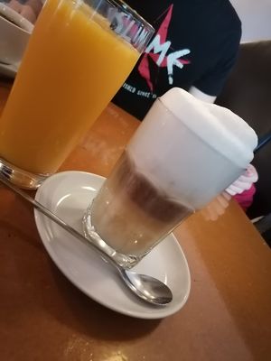 Latte Macciato with Soy Milk and Orange Juice at Cafe Miller in Hamburg