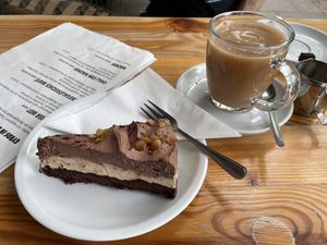 Salty peanut cake and Assam with soy milk    at Cafe Miller in Hamburg