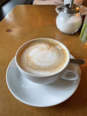 Cappuccino with oatmilk  at Cafe Miller in Hamburg