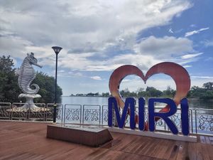 In front of their shop at Eatwell Seafood 素善缘 in Miri