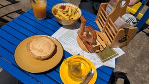 Fries with vegan lentil and bean pie at Gato Legal Coffee Roastery in Ponta Do Pargo