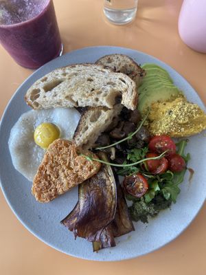 Big breakfast plate! That egg looks so like the real deal - but tastes like plastic   at Kynd Community - Canggu in Canggu