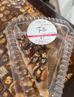 Turtle gluten-free vegan cheesecake   at Yummy SweetCakes in St Louis