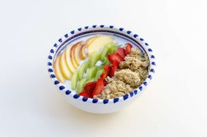 Vegan granola, with fresh fruit and plant-based yogurt (coconut or almond). €7 at Ecologica Bistrot in Palermo