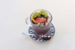 Açaì bowl, with granola and fresh fruit, in a delicious plant-based milk from oat and 3 nuts: macadamia, almond, hazelnuts. €8 at Ecologica Bistrot in Palermo