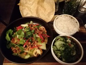 Chickpea curry, papadum, rice, cucumber salad at Proeflokaal Rixt in Ameland