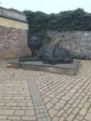 Cute cat sculpture   at The Courtyard Cafe in Bristol