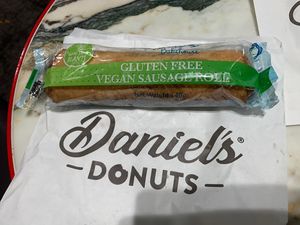 The inside is not bad but the GF pastry is dry and not great    at MEL - Daniel's Donuts - T4 & T1 in Melbourne