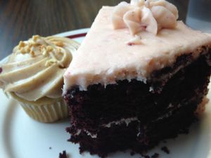 cupcake with peanut butter frosting and chocolate cake with strawberry frosting at Dough Bakery in Atlanta