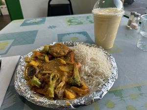 Lentil patties rice plate with mango coconut milk shake  at Lemongrass in Tucson