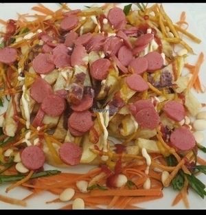 Salchipapas at Loving Hut - Titikaka in Puno