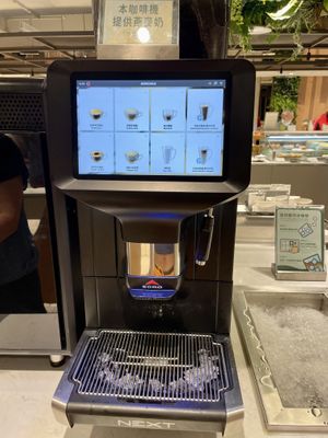 Two coffee machines: one regular and one provides drinks automatically with oat milk!  at Fruitful Food 果然匯 in Taipei