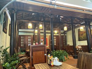 Interior of restaurant, build around an ancient house   at Muro Organic Vegan Restaurant in Nha Trang