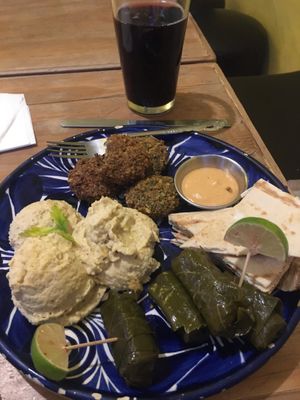 mixed plate of hummus, falafel and grape leaves at Habibti Falafel in Guanajuato