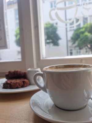 Coffee w/ oatmilk & vegan Chocolate Cookies (spelt flour) at SKÅL in Loerrach