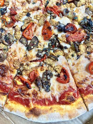 Vegan cheese, vegan tempeh “sausage,” mushrooms and tomatoes   at Whole Foods Market in Richardson