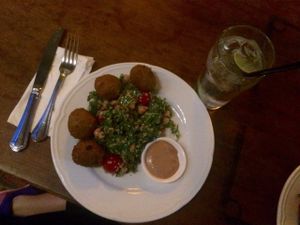 Pumpkin and chickpeas falafel, salad with quinta, cherry tomatoes and chickpeas, cashew cream at F-hoone in Tallinn
