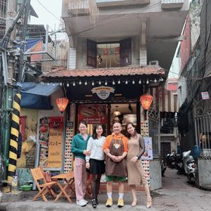 The owner with his friends  at Bánh mì cô Chun  in Hanoi