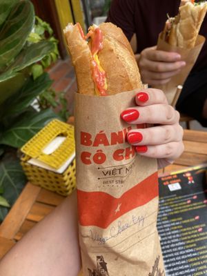 Egg and cheese, too good to not take a bite before pics   at Bánh mì cô Chun  in Hanoi