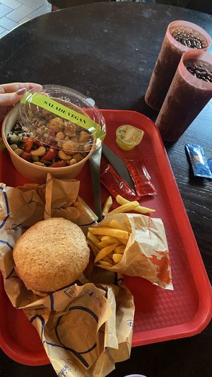 Vegan burger with beetroot sauce, vegan grains salad  at Au Chalet de la Marionnette in Chessy