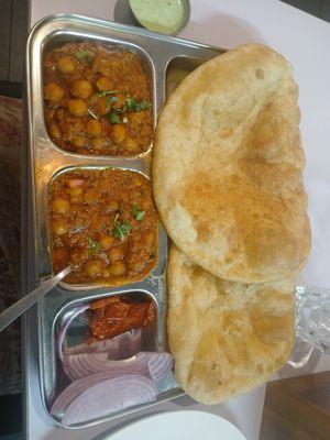 Chickpea curry and fried bread at Himalayan Taj in Adamstown