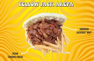 Paired with fresh tomato slices this Arepa reaches every single one of your taste buds at Pacha Roots in Miami