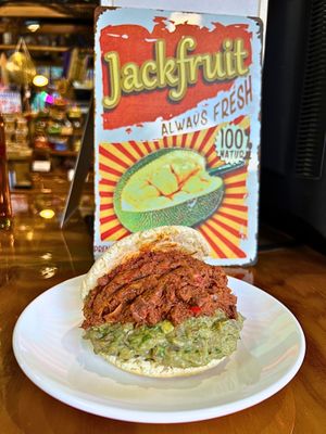 The Royal Arepa. An upgrade of the Best-Selling Arepa - The Queen. Savory Mechada Jackfruit was added to the creamy avocado Queen to create an explosion of flavor on each bite.  at Pacha Roots in Miami