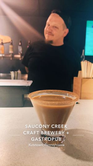 The artwork (espresso martini) and the artist. I brought my own soy milk to sub out the half and half they used for it  at Saucony Creek Brewing in Kutztown