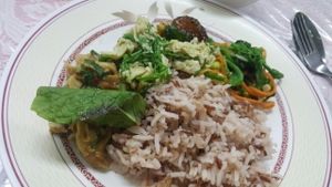 rice with dishes at Sutunthip Vegetarian Food in Bangkok