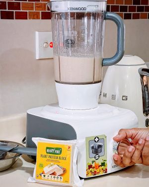 Making pasta sauce with protein block  at HerbYvore Foods  in Central Singapore