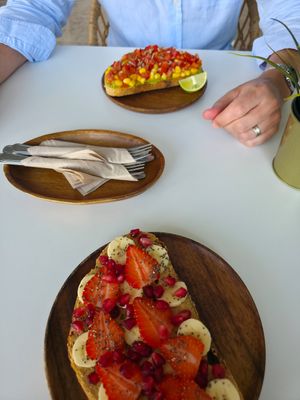 Mexican avacado toast on top and cheeky monkey toast on the bottom, both vegan at Sprout in Muscat