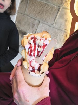 Bubble waffle with 2 scoops of ice-cream, whipped cream, sauce and toppings at Lick in Bakewell
