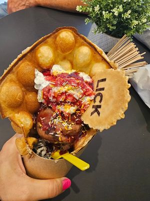 Vegan bubble waffle, icecream, whipped cream, sprinkles, sauce at Lick in Bakewell