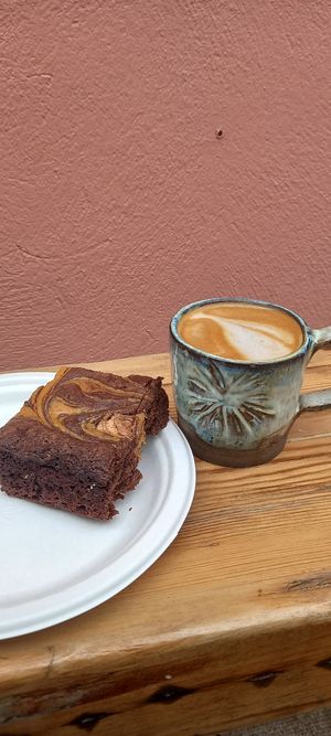Coffee and Vegan Brownies  at Roots Cafe in Perranporth