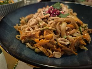 Udon noodles with tofu and veggies, with satay at Yvonne & Nala in Geneva