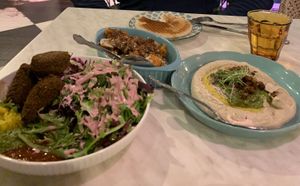 Falafel salad, sweet potato dish, and masabacha hummus with pita    at Florence and the Spice Boys in Sarasota