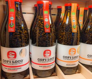 Organic coffee beans in a glass bottle at GLÜCK Café in Siegen