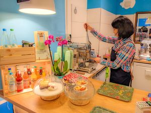 We make our coffee with a traditional lever machine at GLÜCK Café in Siegen