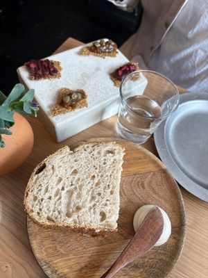 Homemade sourdough, cashew spread, linseed crackers with mushroom pate/pickled beetroot and tomato chutney  at Wilson's  in Bristol