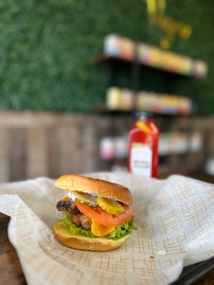 Plant based fish sandwich with fresh juice at Vegan Bar in Naperville