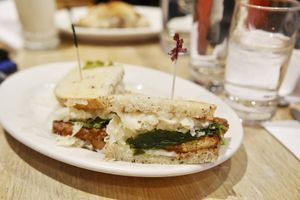 Delaney with vegan cheese at Tommy's Restaurant in Cleveland Heights